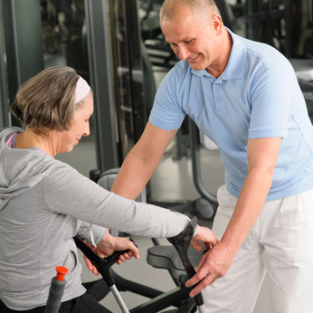 Senior woman with help of physiotherapist