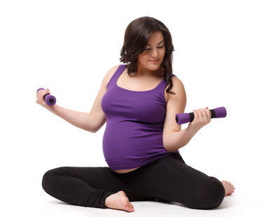 Sports pregnant young woman. Fitness.