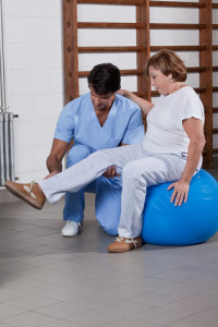 Physical Therapist helping a Patient