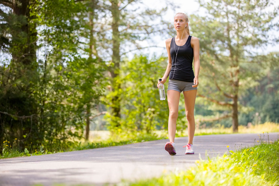 woman-walking-trail