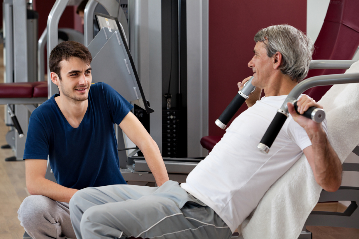 gym training, young man and his father